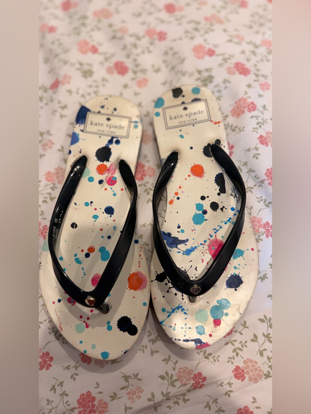 kate spade White Paint-Splash Flip Flop Sandals with Black Straps